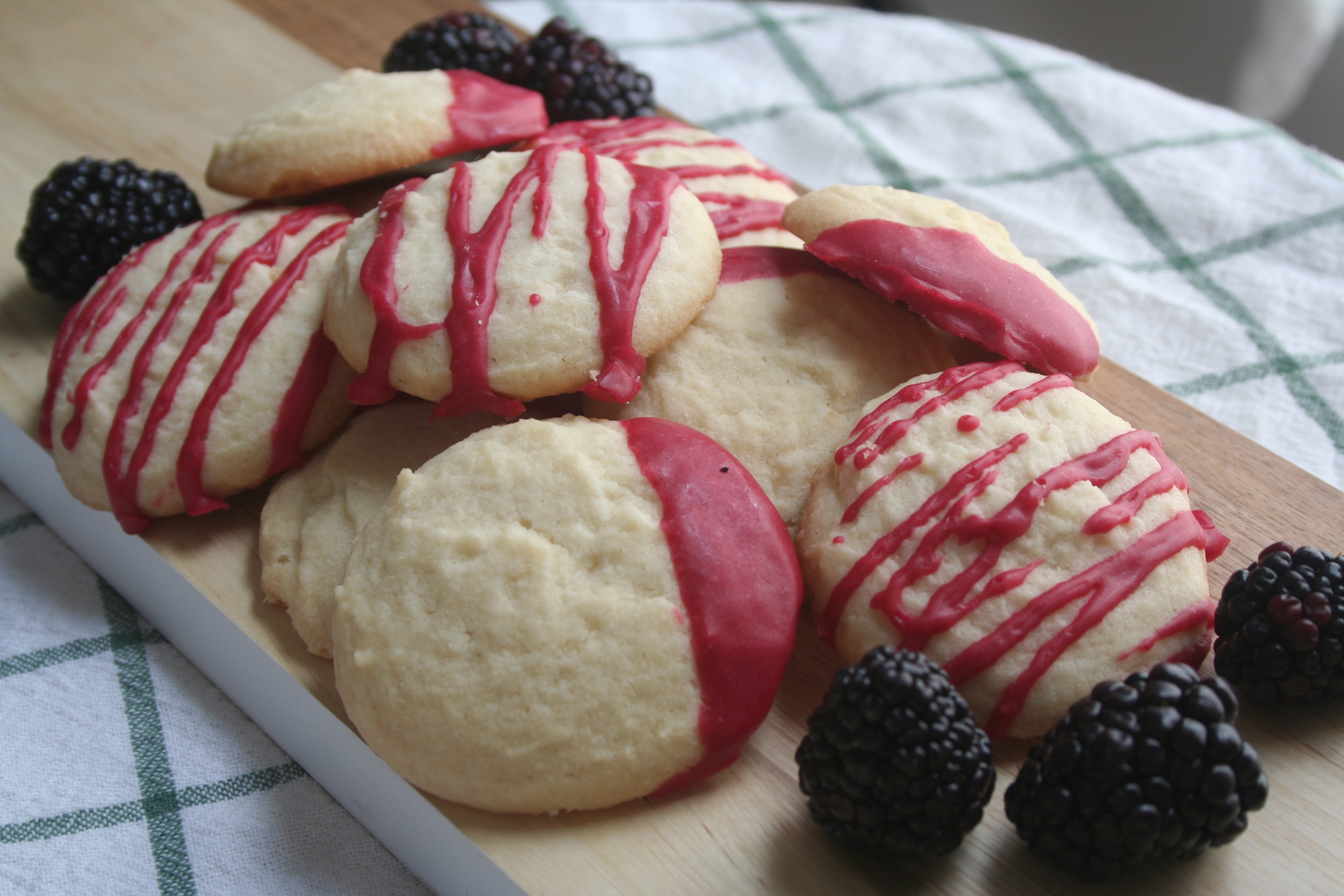 whipped shortbread cookies with blackberry glaze