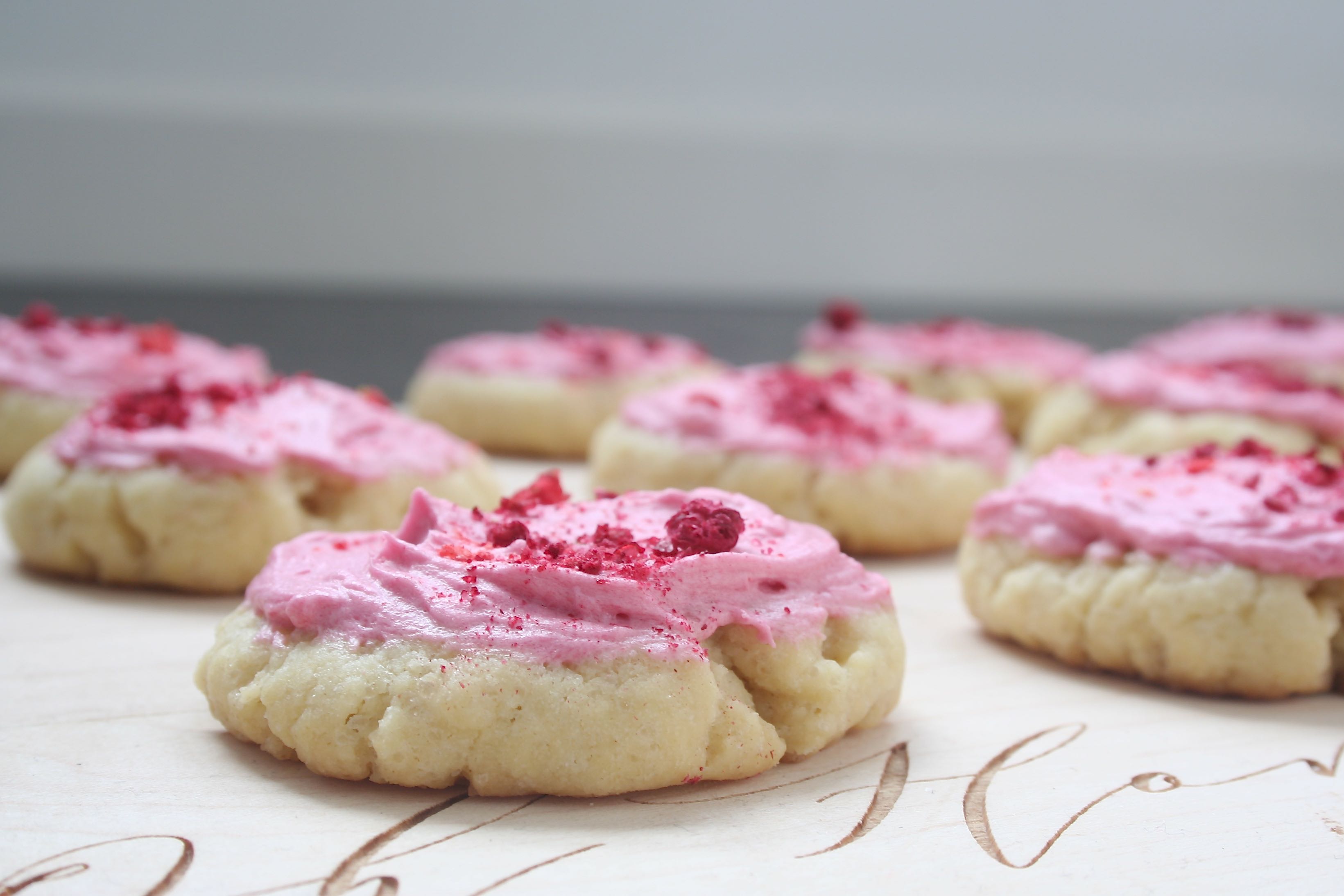 sugar cookies with berry buttercream
